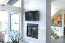 a stylish concrete fireplace