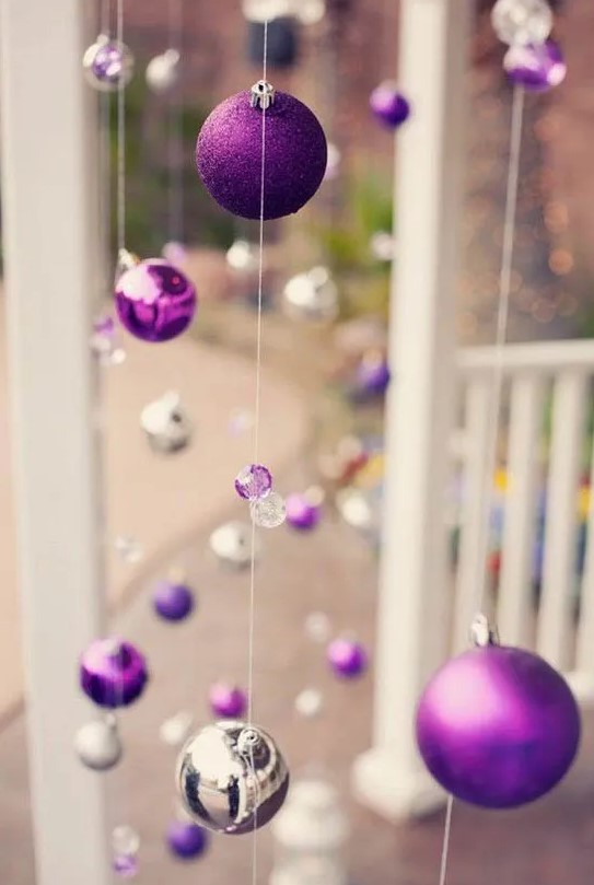keep it simple with hanging ornaments that are suspended from thin strings, this is a fun and elevated look for your home