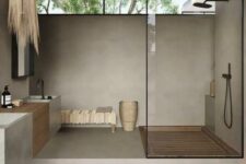 06 a large neutral Japandi bathroom clad with large scale tiles, with a large shower space and a clerestory window, a floating vanity