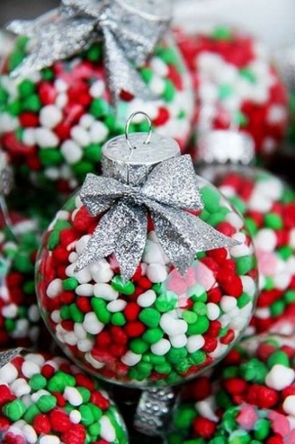 Christmas colored candies will be a great filling for a clear ornament, and they can be used not only as ornaments but also as favors
