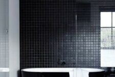 35 a beautiful contemporary bathroom in black, with small scale tiles, a sleek black bathtub and a black vanity is a lovely idea