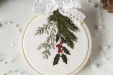 35 a small and lovely embroidery hoop Christmas ornament with real embroidery and a lace ribbon bow on top