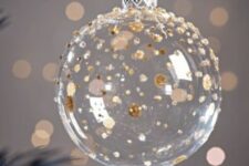 41 a clear glass ornament with gold and copper soft polka dots is a lovely idea for a glam and chic wedding