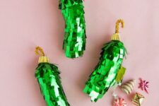 Christmas pickle ornament pinatas like these ones will add a lot of fun to your Christmas tree
