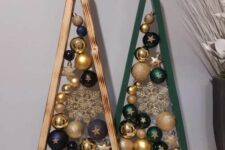 cool tabletop frame Christmas trees composed of gold, navy, emerald ornaments and snowflakes look amazing