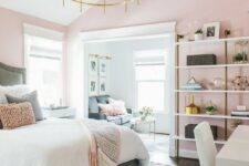 13 a chic bedroom with pink walls, pink pillows and a blanket, touches of gold and brass for a glam feel