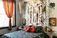 a gorgeous boho bedroom design with floral print accents