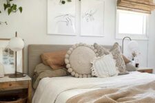 29 a neutral bedroom with a boho feel, an upholstered bed with textural bedding, a woven rug, wooden nightstands and greenery