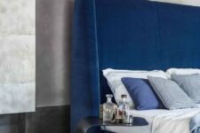 61 an ultra modern electric blue wingback headboard accented with a catchy curved nightstand