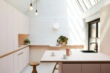 a cute pastel attic kitchen design