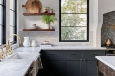 08 a chic dark grey farmhouse kitchen with white quartz countertops and a white marble tile backsplash, stained floating shelves and mixed metals