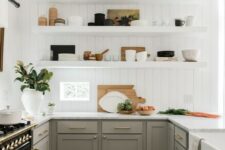 35 a pretty U-shaped kitchen with grey shaker style cabinets, white countertops, white floating shelves and brass and gold touches for elegance