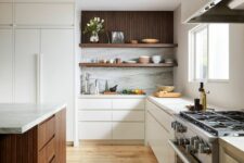 a contemporary kitchen sleek flat panel white cabinets, open shelves, a dark-stained kitchen island and white stone countertops