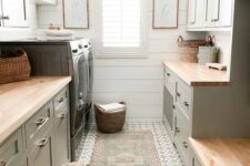 a laundry room designed with kitchen cabinets