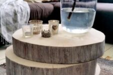 06 a creative yet simple tree slice stacked coffee table is a perfect rustic home decor piece that can be easily DIYed
