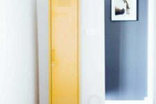 08 a small bright yellow locker placed somewhere in an awkward corner will give you enough storage space and will add a touch of color