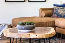 09 a lovely tree slice hairpin leg coffee table with a laminated surface is a stylish addition to a mid-century modern living room