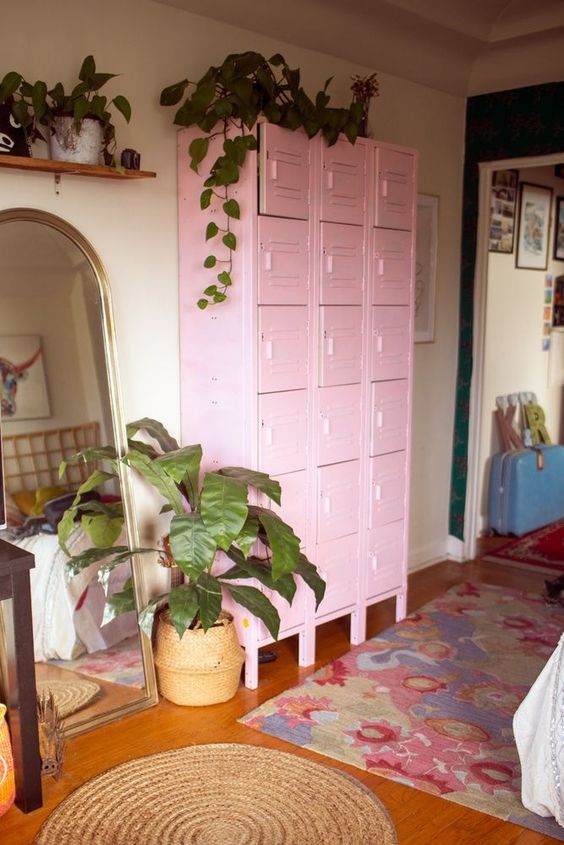 a pink stack of lockers is a lovely storage idea for many spaces, it doesn't look bulky and gives a lot of storage space