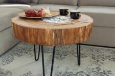 15 a tree slice coffee table on hairpin legs will add a rustic feel to the space and will make it cozier and lovelier