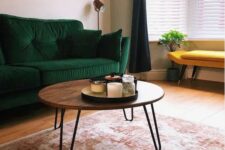 17 a cool mid-century modern coffee table with a rich stained round tabletop and hairpin legs is pure elegance and timeless style for your living room