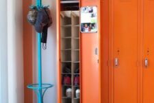 21 a mudroom with bold orange lockers and a blue rack is a cool and bright space, and these colors raise the spirits