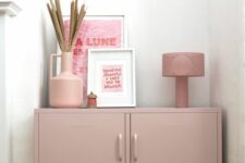 27 a dusty pink locker unit with various decor can easily match many spaces, and its delicate will makes it look softer