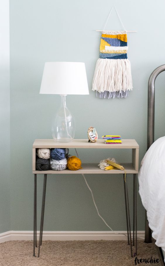 A small and cool whitewashed nightstand on hairpin legs is a cool idea for a mid century modern or boho bedroom
