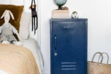 48 a small navy locker as an alternative to a nightstand, it’s a great storage piece that is practical and will add a touch of color