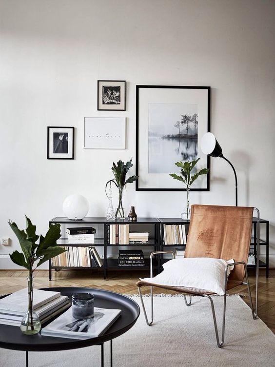 A leather chair with hairpin legs is a great addition to a mid century modern living room