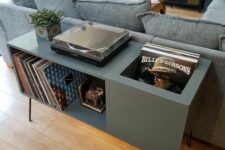 53 a graphite grey music console with plenty of storage and black hairpin legs is a chic and stylish idea for a living room