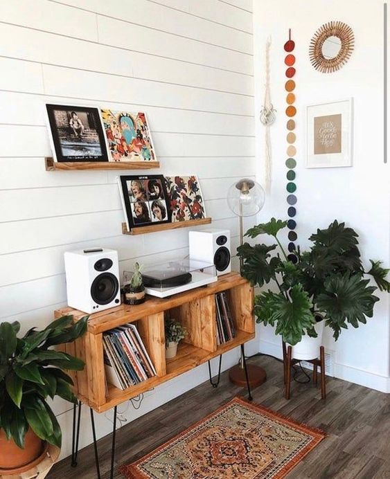 A beautiful and stylish music console of a crate box with hairpin legs will perfectly match a boho or mid century modern space