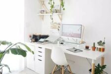 a Nordic home office with a white desk, file cabinets, a white Eames chair, wall-mounted shelves, potted plants and touches of gold