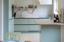 a practical kitchen with a tiny kitchen island