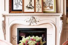 a modern and luxurious French fireplace with an arrangement of artwork on the mantel will add chic to any space
