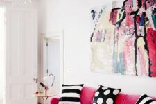 a trendy living room design with a velvet sofa