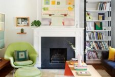 a beautiful mid-century modern living room with a fireplace, bookshelves, a green Wumb chair with an ottoman, a duo of coffee tables