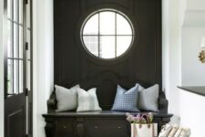 an entryway with a cool porthole window