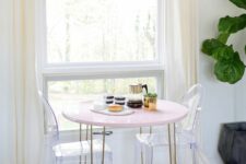 a cute pink hairpin leg table is perfect for a small dining space