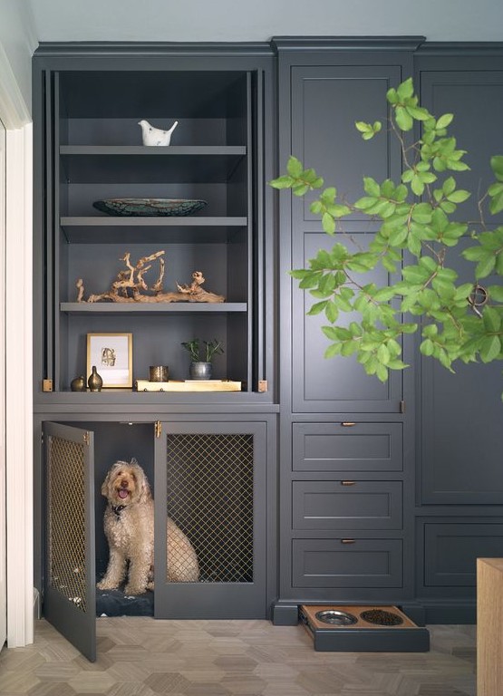 a modern farmhouse kitchen in graphite grey with a cabinet turned into a dog crate and a drawer with the dog's bowls
