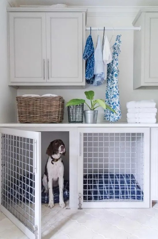 a neutral laundry room with a lower cabinet turned into a dog crate with bold blue printed mattresses is a cool idea
