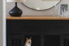 a stylish black console table with built-in dog crates is a lovely idea for a modern high-end interior
