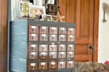 14 a renovated card cabinet on tall legs with various decor is a lovely soluton for a vintage or rustic entryway
