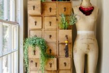 24 a vintage stained card cabinet as a storage unit and a plant stand is a lovely and cool idea for a vintage-infused space