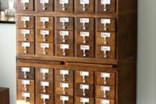 25 a vintage stained card catalogue on casters is a cool addition to a home office, it looks stylish and adds charm to the space