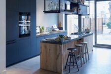 27 a contemporary black kitchen with sleek cabinets, a stained kitchen island and a suspended black shelf plus black stools