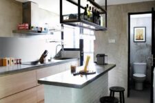 29 a contemporary meets minimalist kitchen with stained cabinets, a tiled kitchen island, a suspended shelf over it
