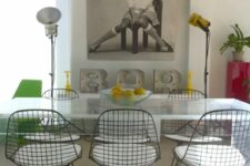 a cool industrial dining room with wire chairs