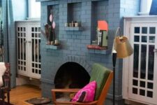 a lovely pastel living room with a brick firepalce