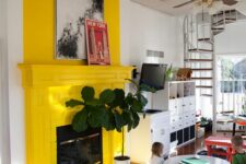 37 a modern living room with a bold yellow fireplace, a striped rug, some potted plants and some artwork