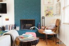 44 a teal brick fireplace, even a non-working one, is a very non-traditional decor feature to go for
